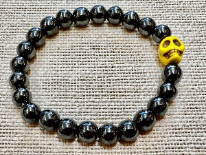 Hematite 8mm Beads with 10mm Magnesite Skull Bead - 19cm Elasticated Bracelet  (ref SHMB122864)