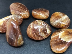 Calcite - Red - 2 cm Tumbled Stone.