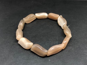 Moonstone - Beige Wave shaped Beads, Elasticated Bracelet.