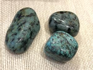 Turquoise stone on sale with black spots